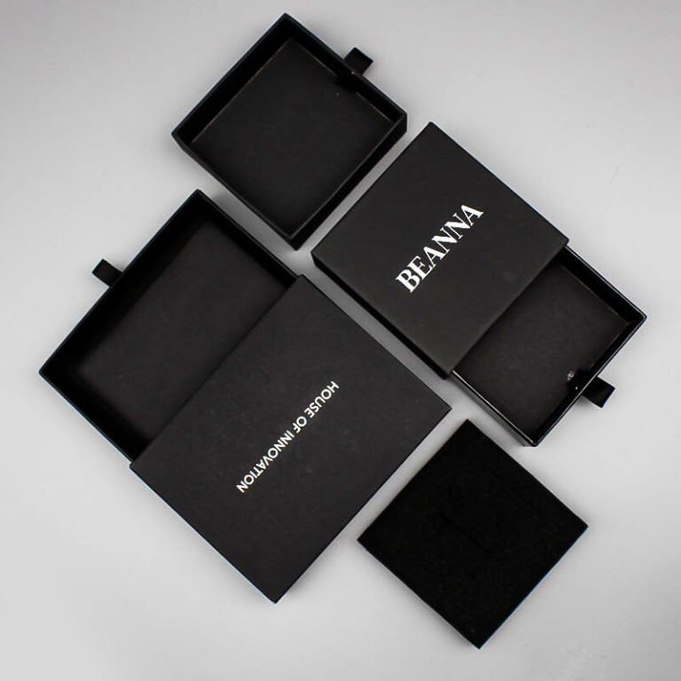 Black rigid gift boxes with fitted inserts and printed lids