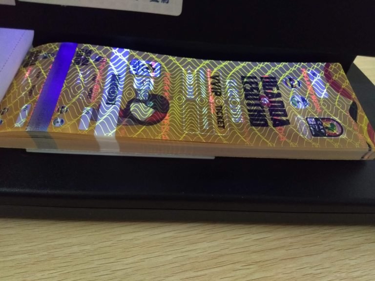Holographic security print sample with reflective foil patterns